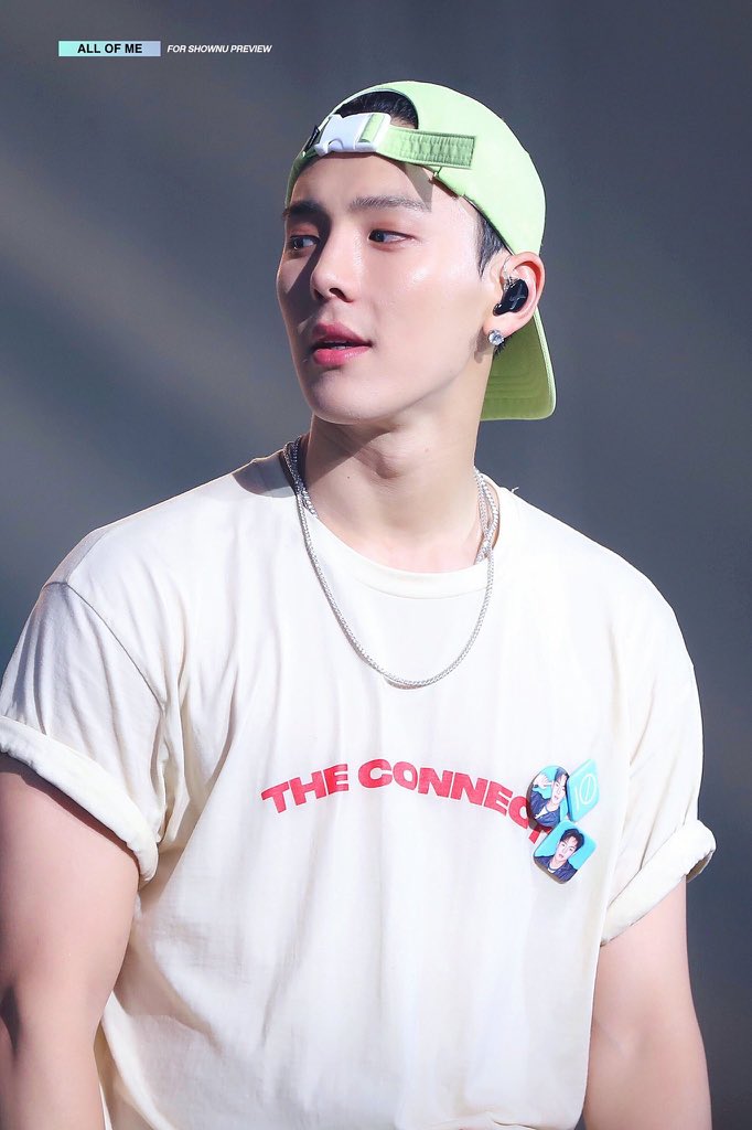 shownu wearing a cap/headwear; a thread