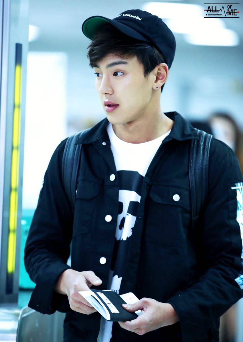 shownu wearing a cap/headwear; a thread