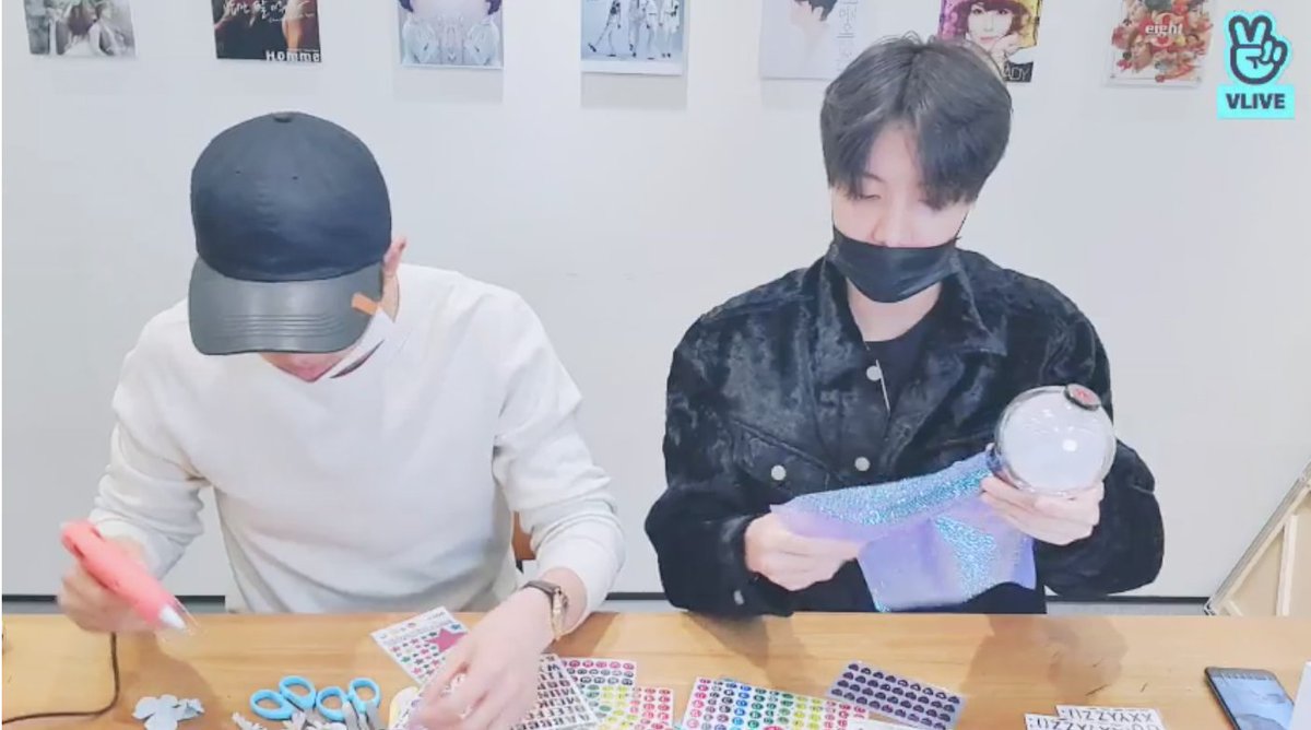 RM waves the glue gun around, promising it is definitely, most assuredly, not dangerous for him to use. JH reminds him that saying safety is first, second and third! RM says nah, third is coolness. RM: (ENG) "Yo, c'mon! I'll give you my gunshot! Yo c'mon!"