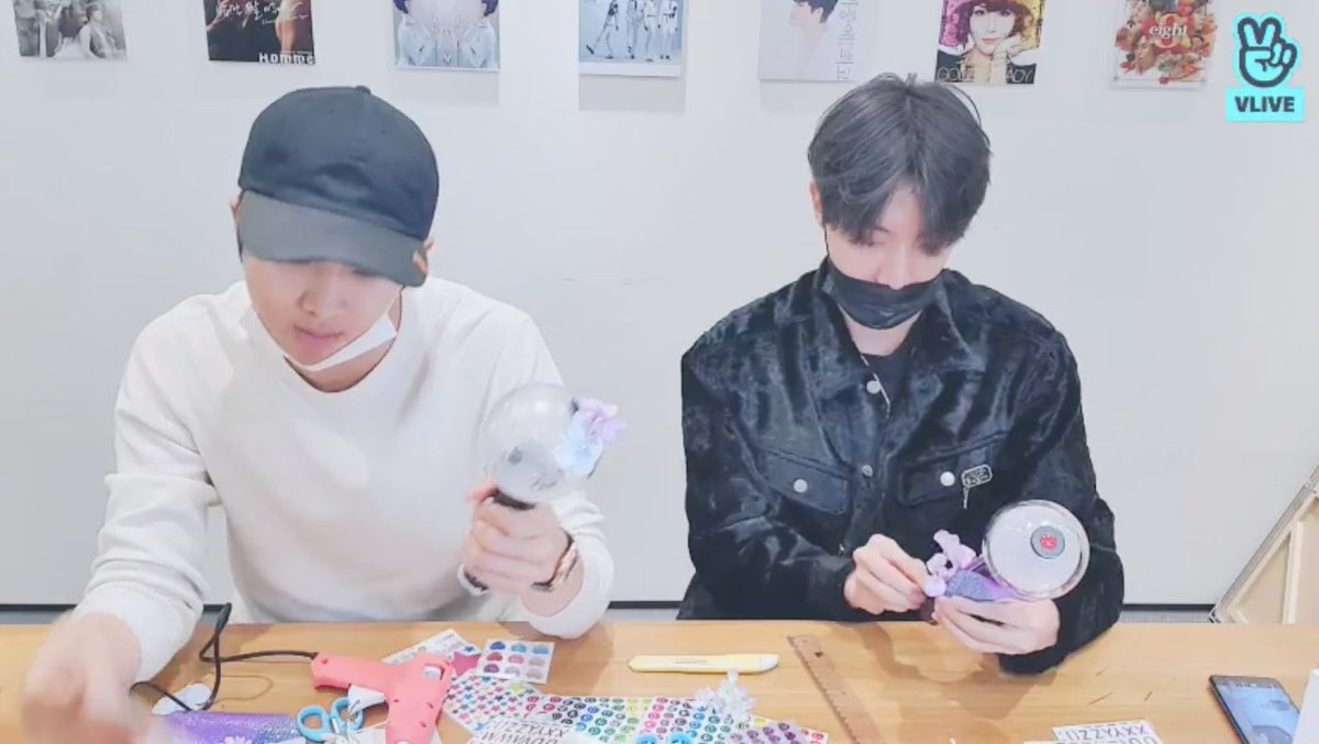 JH is quite proud of having clothed his in purple. RM added another flower, and the numbers 94 on the middle. JH asks what RM's been up to, and he says that he's been eating pasta and watering his plants.
