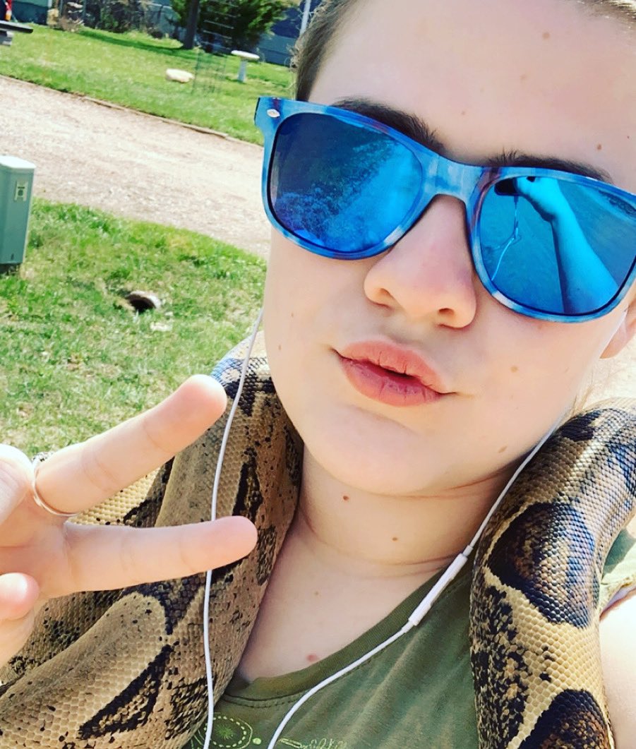 //I know I don’t post much here cuz im always working and mostly on tumblr or discord but look at my snake and I enjoying some much missed sunshine