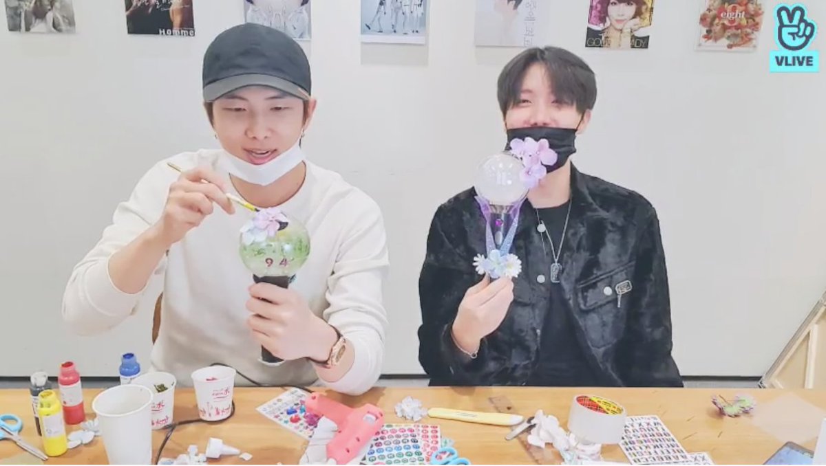 JH suggests his looks like a carnation. (In Korea also, carnations are the chosen flower for Parents Day. It's a typical activity to make your red/pink carnation at school, after school activity, or church & deliver it to them.) An ARMY suggests JH's looks like an Elsa bomb!