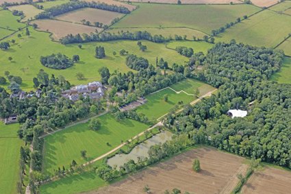 Our stunning open-air theatre and log cabin are surrounded by a beautiful wooded glade! There’s a special aura and magic about our open-air theatre on a beautiful English summer’s evening ​and wow... doesn't it look spectacular from above! #hotel #grounds #theatre #shows #forest