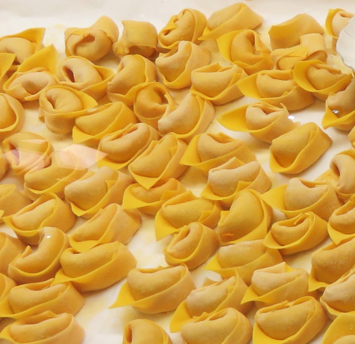 Yuta as cappelletti - cute on the outside and has a tasty filling- typical Christmas/Easter dish (with chicken/veggie broth) in some regions, a symbol of memories to cherish- Perfect to feel warm when you need it- the shape resembles a navel (Yuta navel piercing )