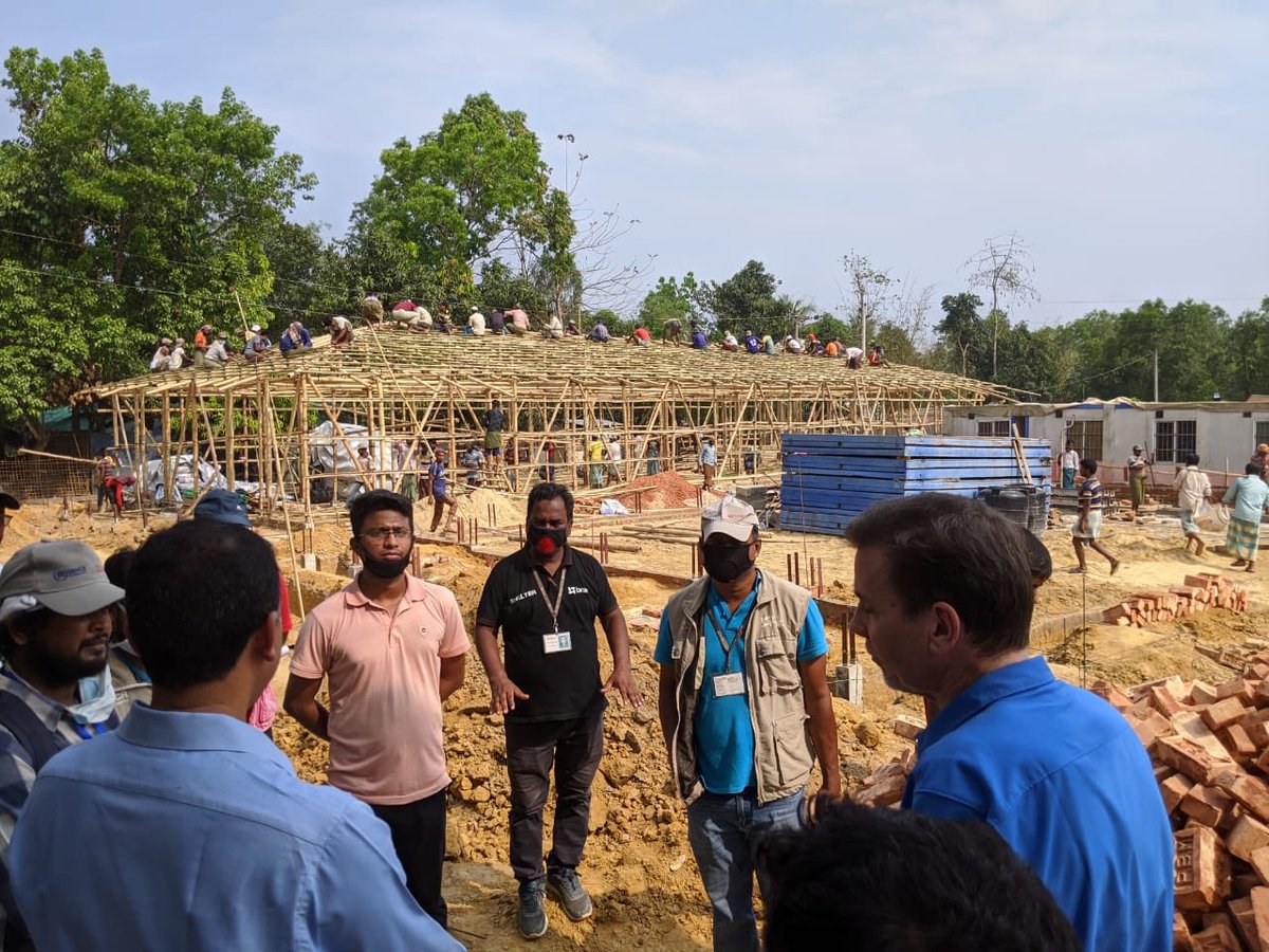 CorlissUNHCR's tweet photo. Update on the race against time: Construction of the COVID-19  Isolation and Treatment Centre for #Rohingya refugees and local Bangladeshis - two weeks ago and today. Amazing people making incredible efforts. https://t.co/r4qj6FXpdQ