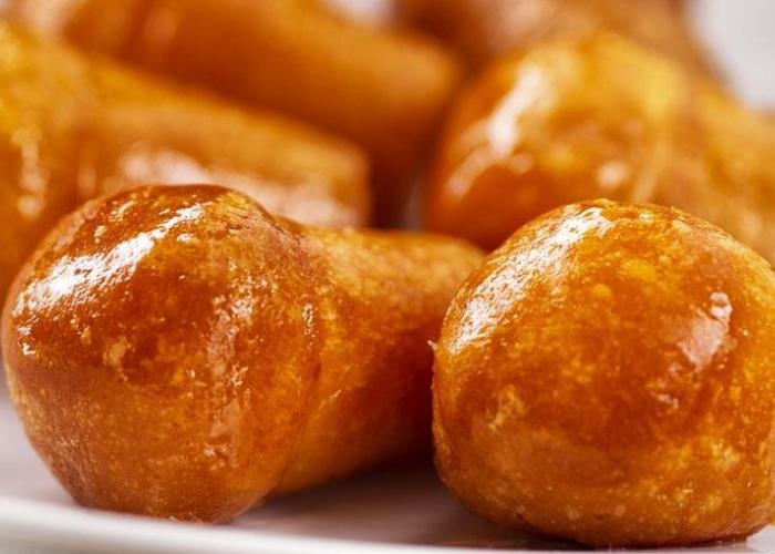 Ten as babà napoletano- soft and sweet- drown in rhum or limoncello, or only water and sugar for kids- a must try of Neapolitan cuisine- makes you a bit tipsy- once you try it you can't get enough of it- hard to imitate - small but powerful