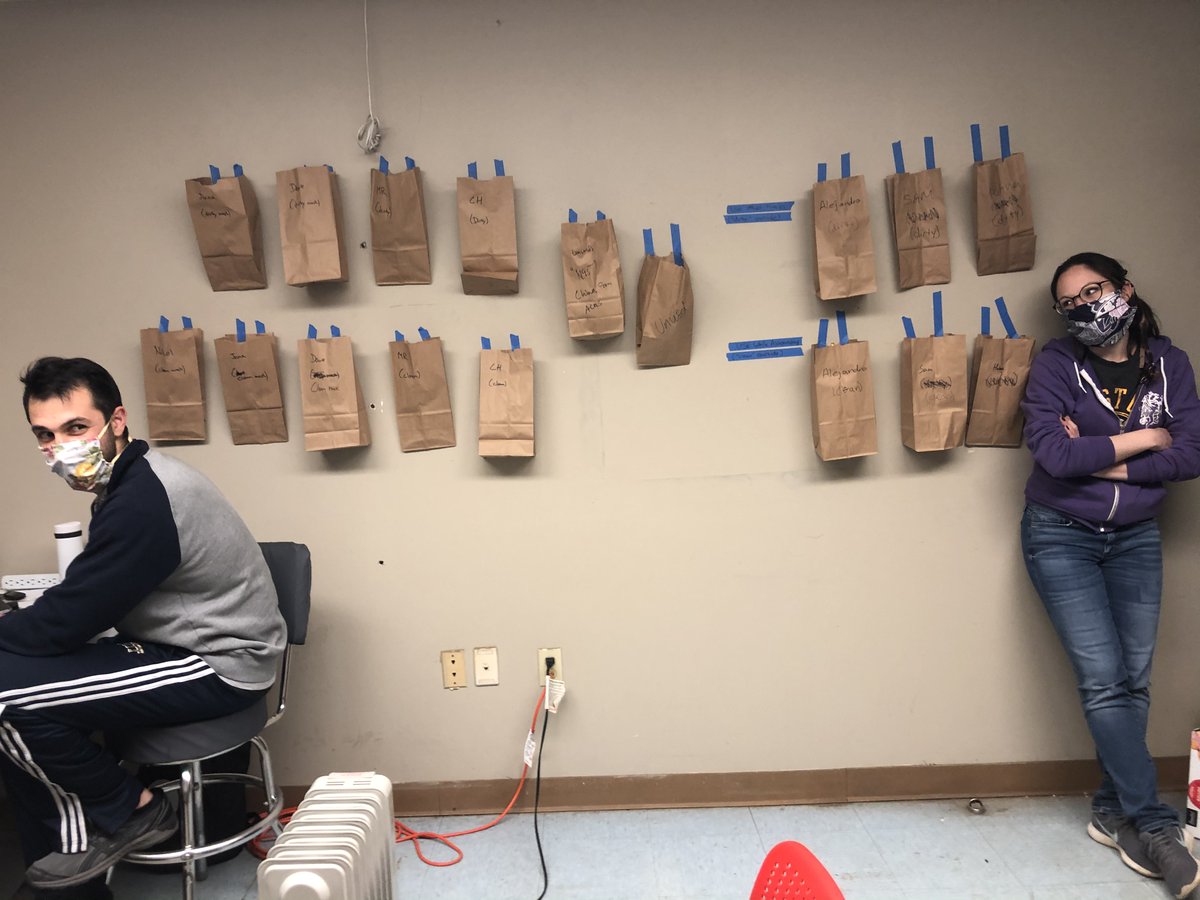 PPEConnectPGH's tweet photo. Staying safe in the PPE Connect space - everyone gets two masks: one for assembling shields, one for walking around the space. Each volunteer gets two brown paper baggies, to keep them clean and separate. How are you staying safe? #ppeconnectpgh #donate #ppe #covid #covid19 https://t.co/sGLtPQVK0o