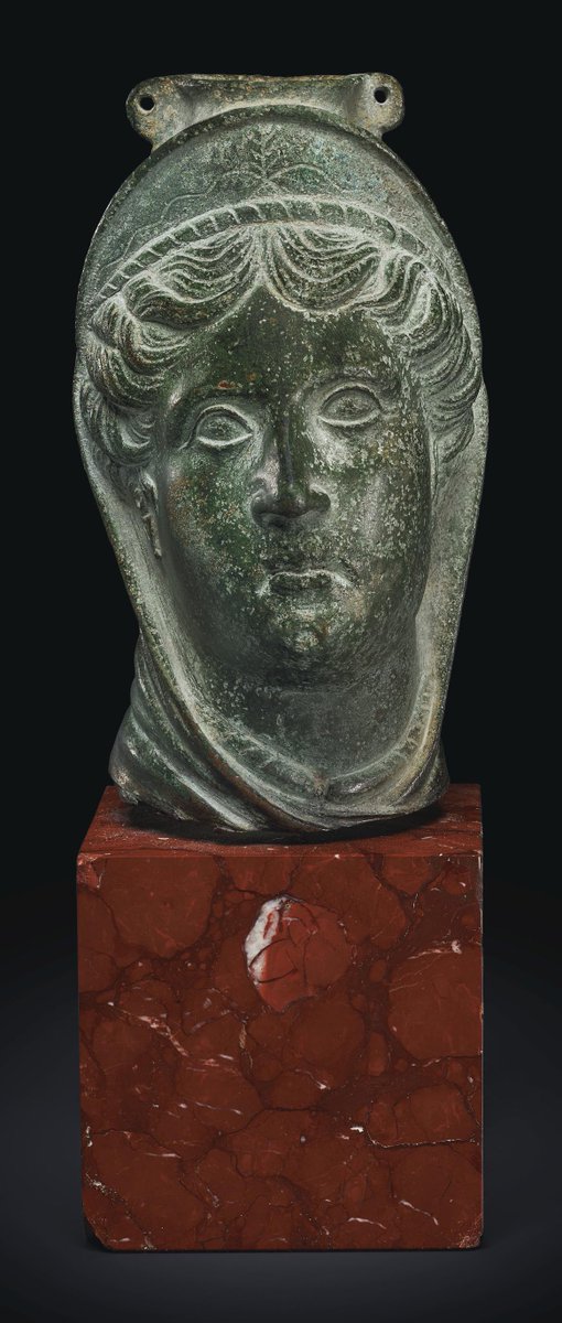 This supposed Etruscan statue is NOT AMUSED.  https://www.christies.com/lotfinder/ancient-art-antiquities/an-etruscan-bronze-balsamarium-circa-3rd-century-6257696-details.aspx?from=salesummery&intobjectid=6257696(Also - Etruscan? That's not where I would have aimed the dart on the "pick a random attribution" board.)