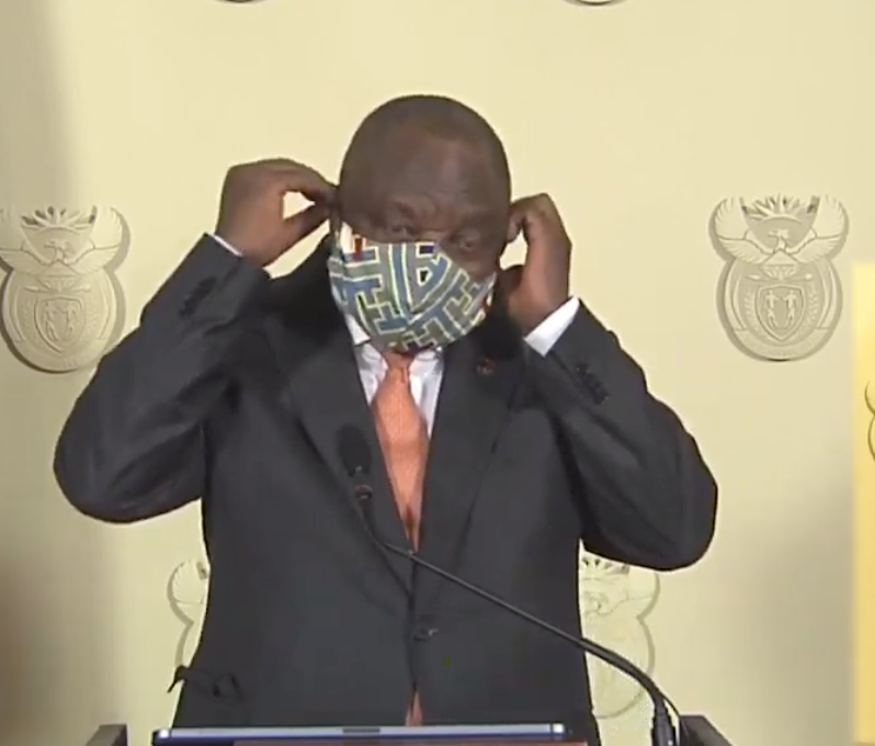...And Ramaphosa ends his national address with putting his own cloth mask on.