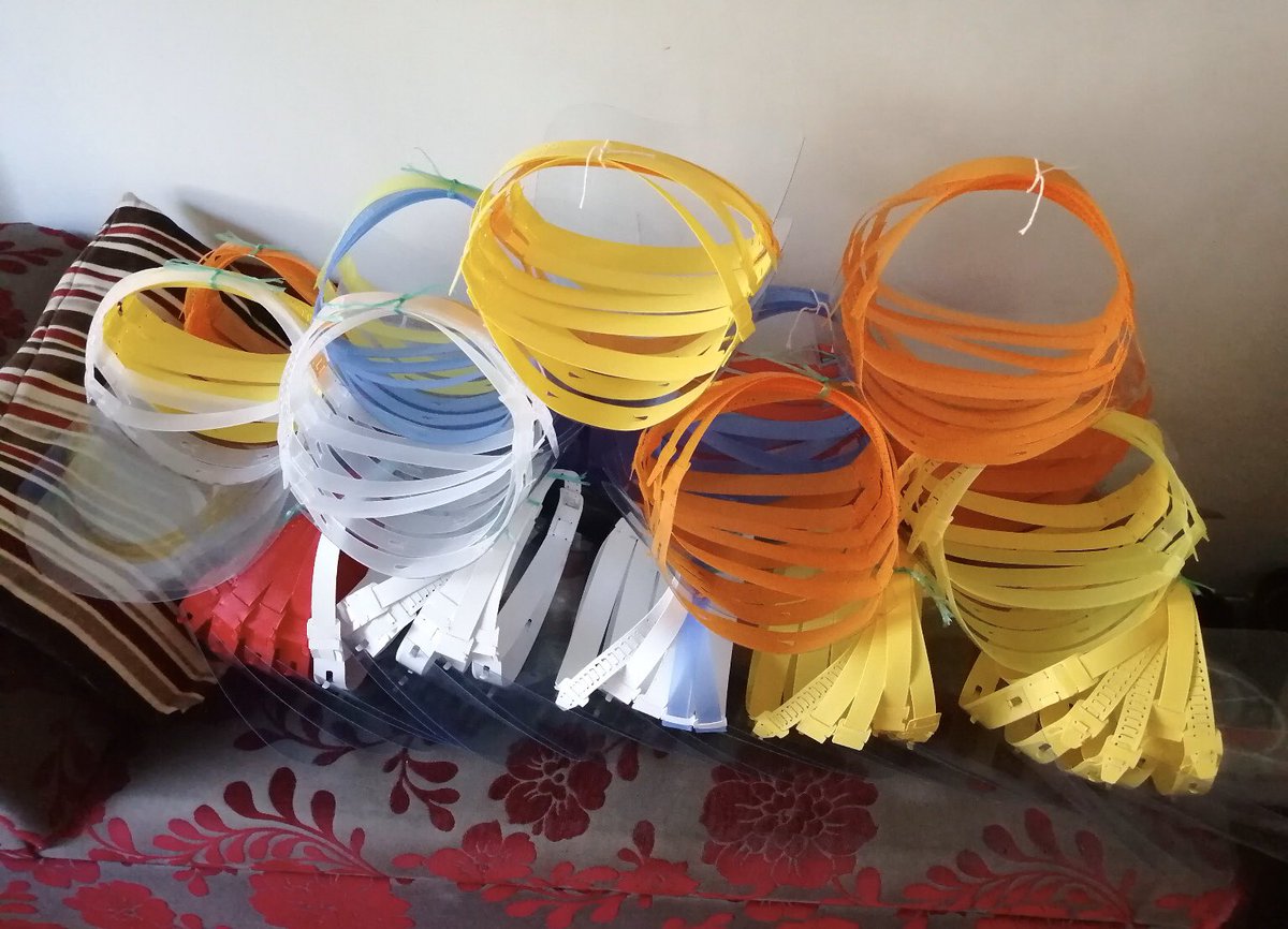 NewHallArtDept's tweet photo. Mr Adams is proving to be a one man factory; 100 more face shields (suitably with rainbow coloured headbands) now made and ready to go to Broomfield Hospital in Chelmsford #nhs #COVID19 #wearenewhall https://t.co/oeGcH2OPmR