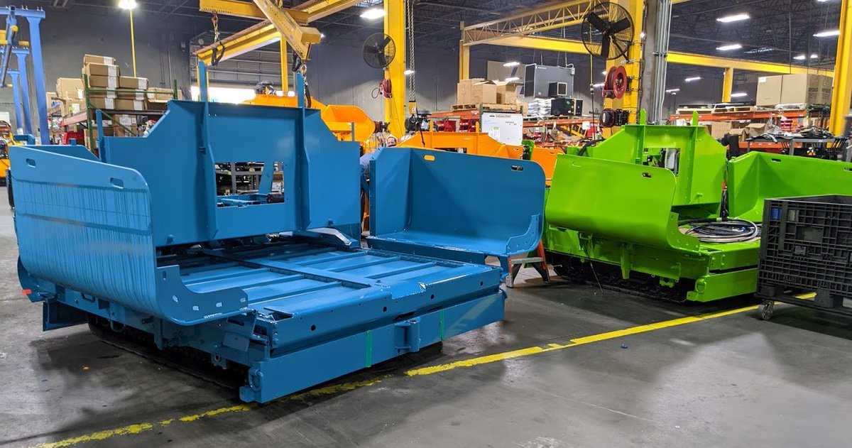 TrustLeeBoy's tweet photo. LeeBoy is getting colorful in the shop....the one on the right is “Seattle Seahawk Green.” These unique pavers were sold by @PapeGroup and W.I. Clark Company. #TrustLeeBoy #LeeBoyProud https://t.co/AX3lzcTMg5