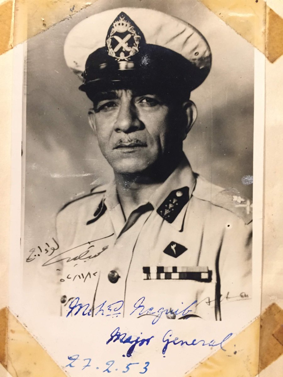 I can't figure out if that is our own Ann Turner in the picture, but she somehow got an autographed picture of Major General Naguib. And she taped it into the book!