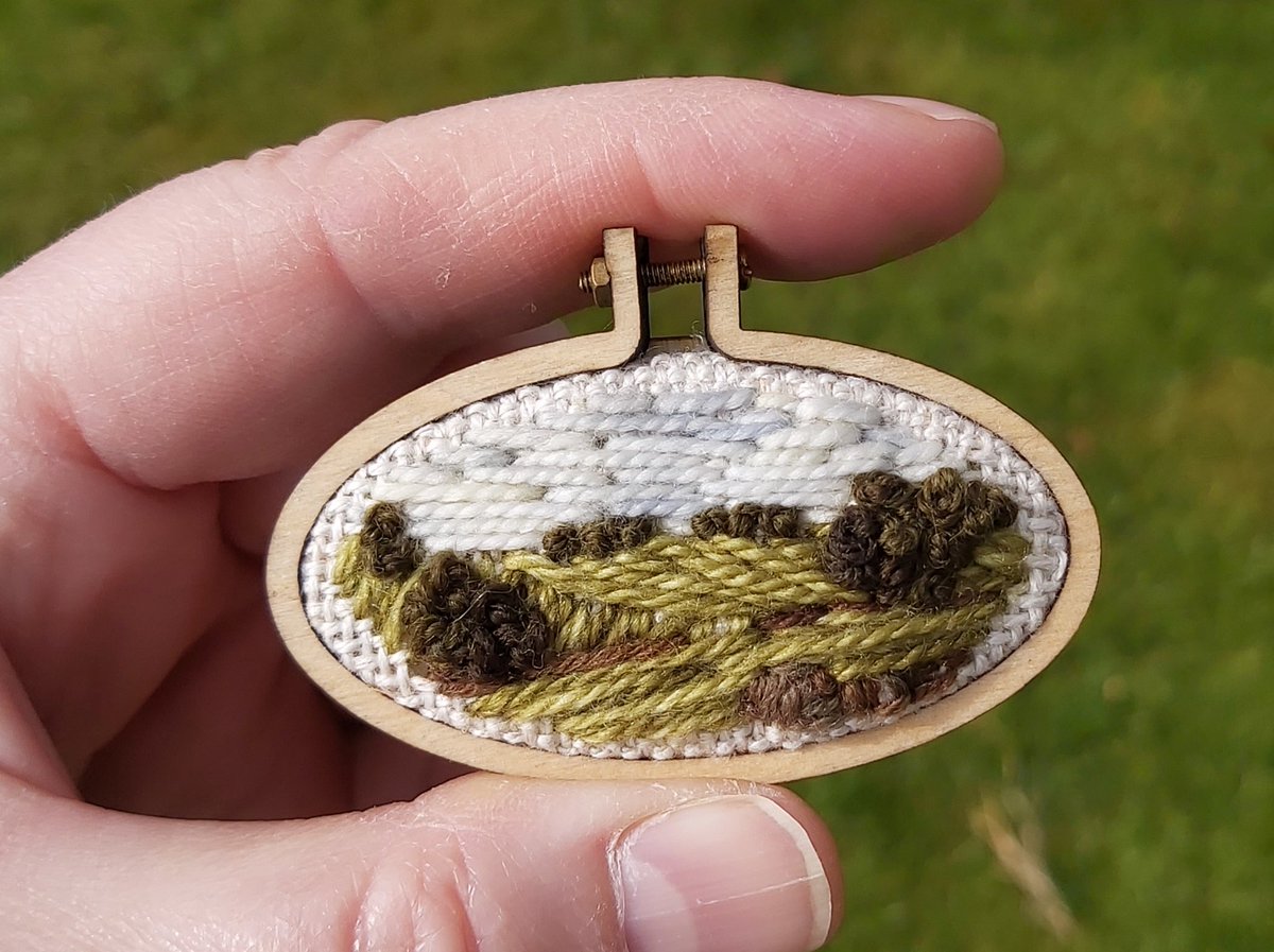 I made a thing. A tiny thing. Would people be interested in more of these things?
#viewfrommygate #viewfrommywindow #viewfrommyyard #miniature #fineartinstitch
#societyforembroideredwork #fineartinstitch 
#landscape #landscapeartist #stitchedlandscape #embroideredlandscape
