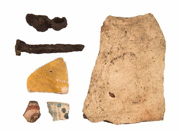 several artifacts excavated from the site