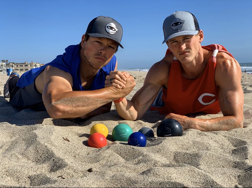 Berticushill's tweet photo. We may work for different teams, but we can both agree that @DrivelineBB plyo balls, @PitchingNinja hats, and friendship are absolute essentials during this quarantine. #QuaranTEAM https://t.co/J19t5yLj7g