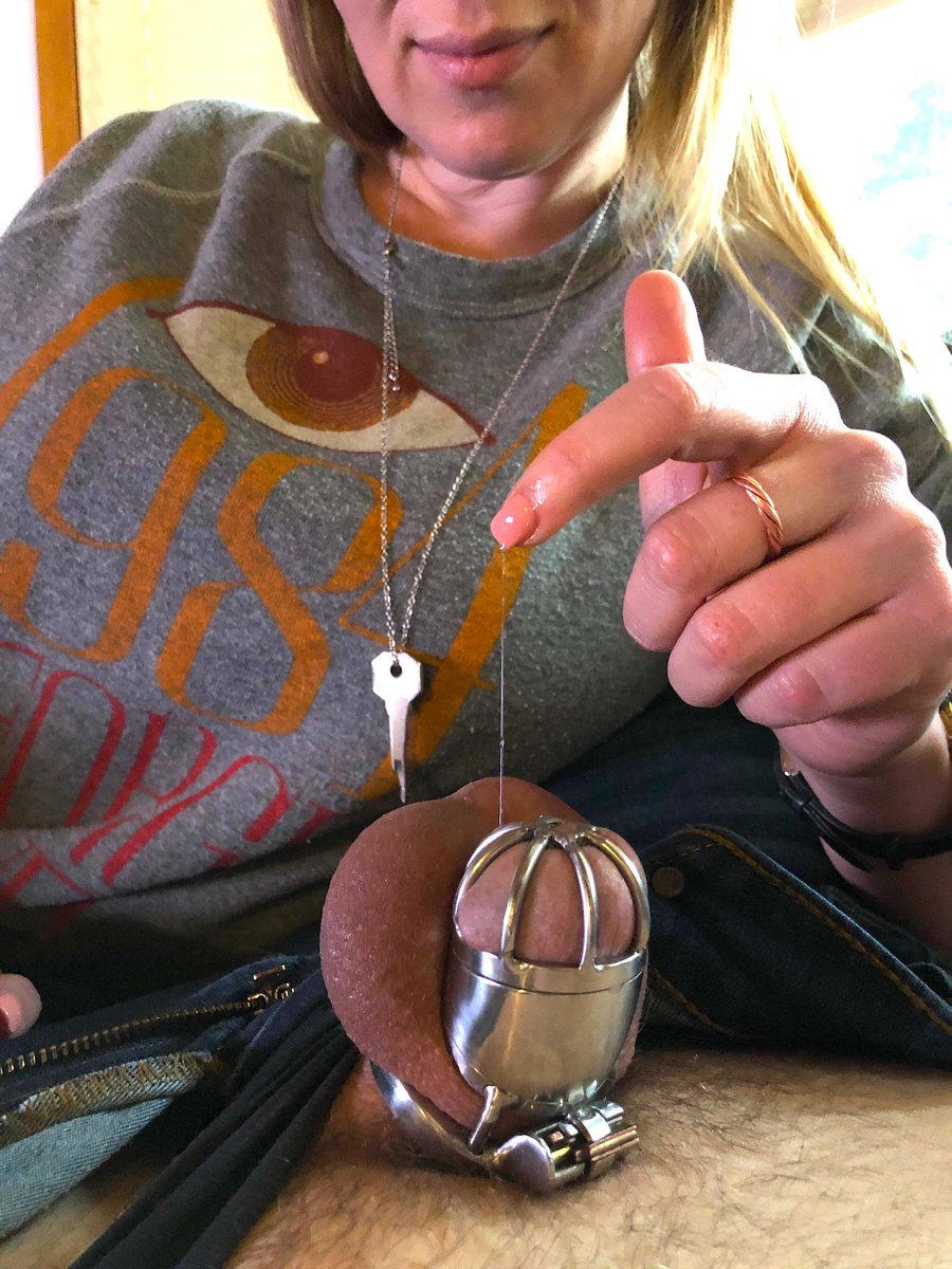 She's checking to make sure he's all set and secure in his new cage; no longer concerned about arousal, erections and orgasms - as he is now property of his #keyholder and she makes all decisions regarding any relief. #Femdom