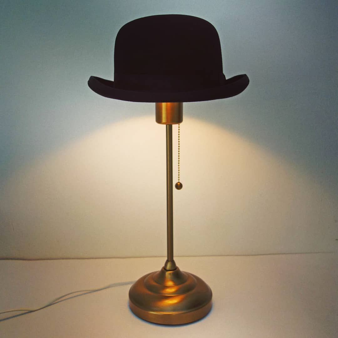 matthias_braun's tweet photo. MAGRITTE TABLE LAMP Matthias Braun 2020 25 x 30 x 50 cm modified ikea table lamp, bowler hat #matthiasbraun #contemporaryart #contemporaryartist #tablelamp #bowlerhat 
#minimalart #conceptualart #minimalism #ikea #arstid #magritte #renemagritte #surrealismus #kunstobjekt #lamp https://t.co/fDNJUHFPZ3