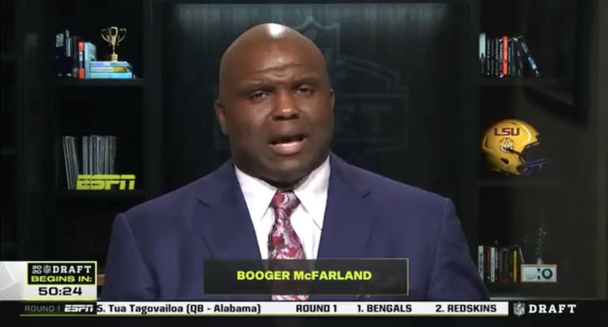 What is that trophy in the top left hand corner of Booger McFarland’s room? It’s smaller than a paper weight.