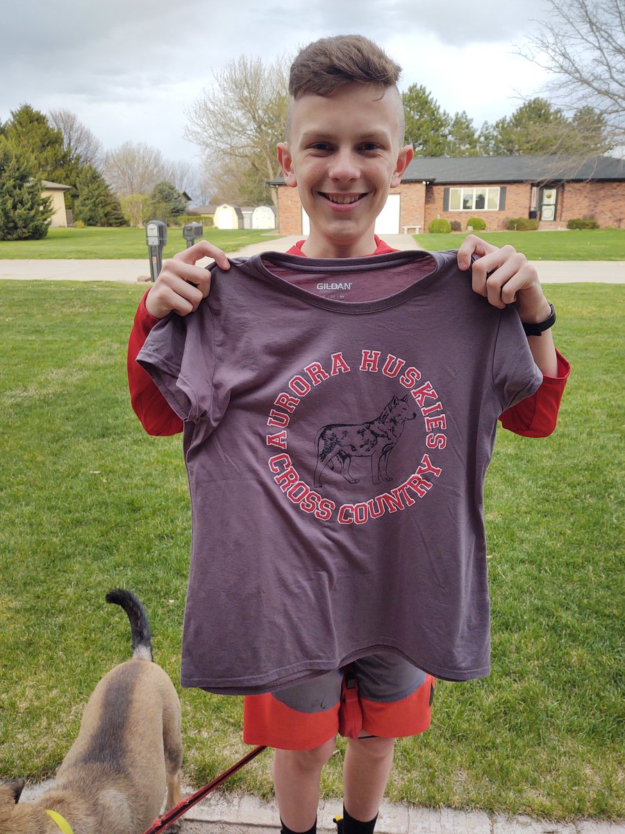 #stillrunningstrong
#ThrowbackThursday 
Aurora Middle School runners!
T wearing her oldest participant shirt, last year's camp.  But we dug out the t shirts from Colin's Middle School seasons for the photo opp!