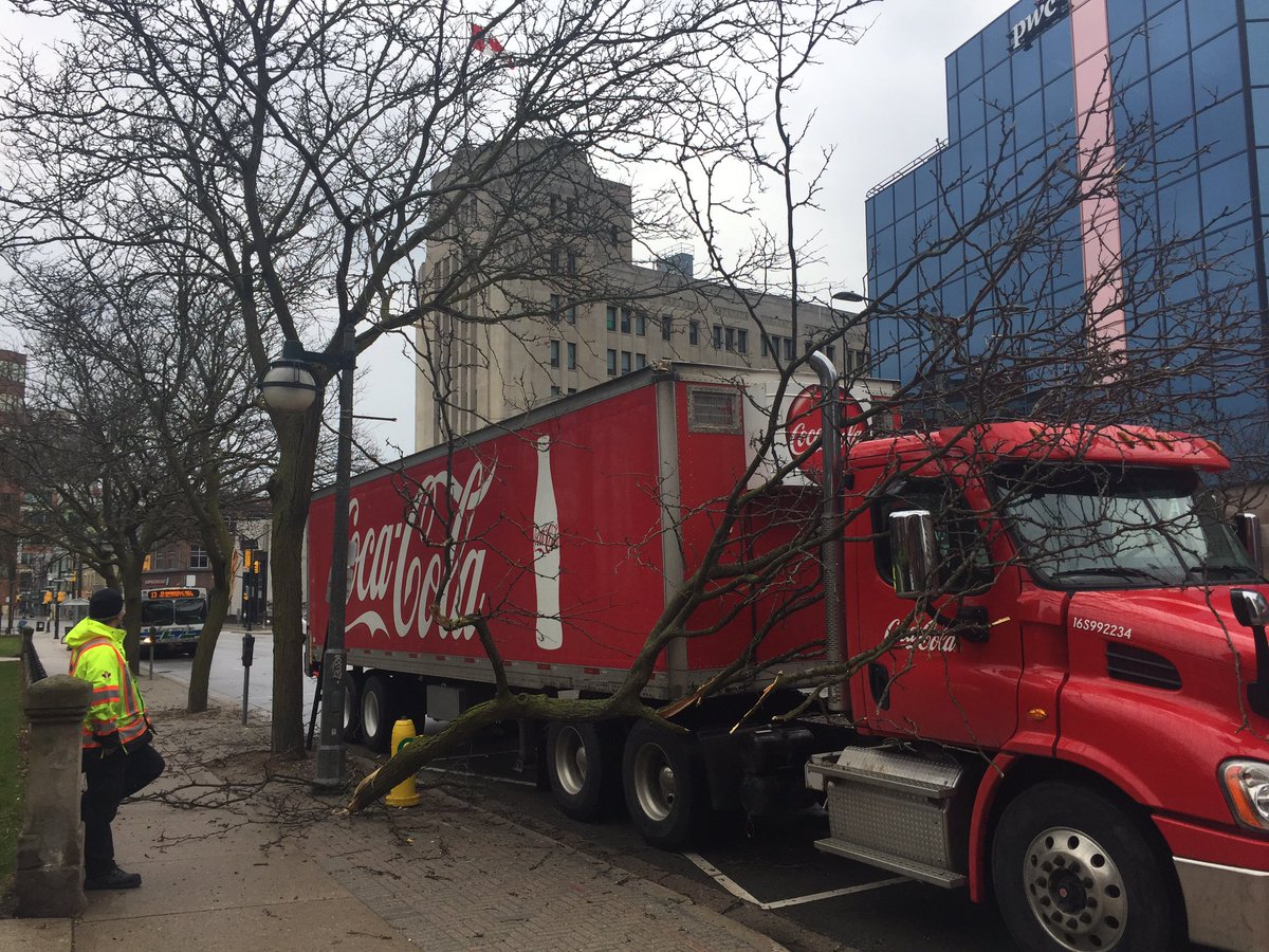quittyprickly's tweet photo. Stopped at Boxcar Donuts on Richmond (pandemic necessity) and saw this sheepish driver out front who had taken out a rather large tree limb with his Coke-mobile. #coketastrophe https://t.co/tdU8oz8XRh