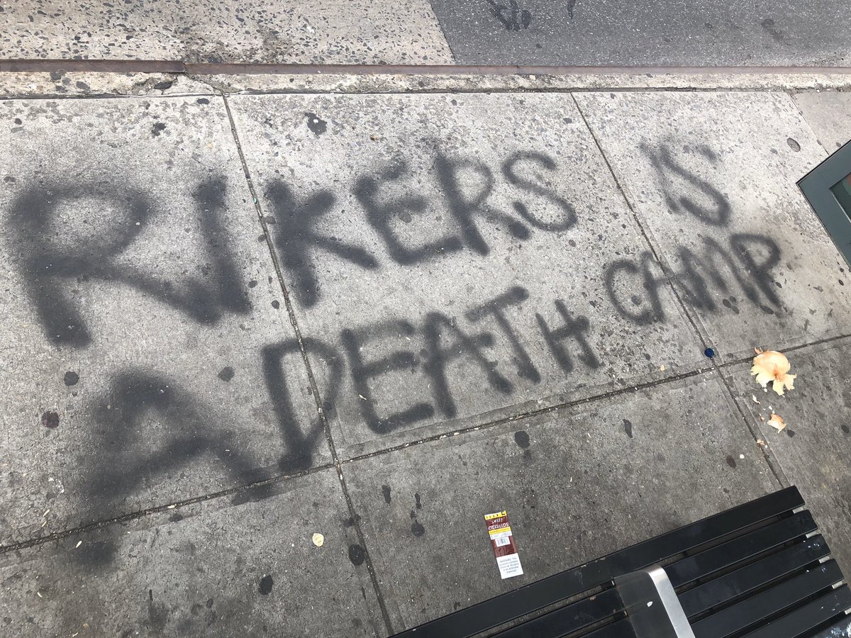 At a bus stop in Bed-Stuy