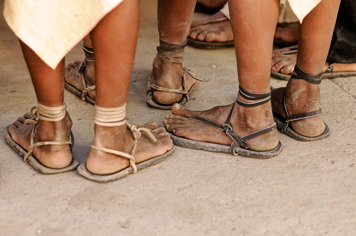 The Tarahumara wear barefoot stlye 'Huaraches' to run in. They are an open type of outdoor footwear, consisting of a sole held to the wearer's foot by straps passing over the instep and around the ankle.Western running footwear is hindering your natural running gait.