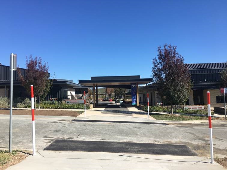 GoogongLearning's tweet photo. Exciting progress has been made on the Rosa St pedestrian crossing! Thanks to the fabulous team @QbnPalerangRC 
The crossing, at the Rosa Street entrance to the School, features new blisters, ramps and poles for ‘children crossing’ flags. The project is funded by QPRC. #TASG https://t.co/TfqufgVXGO