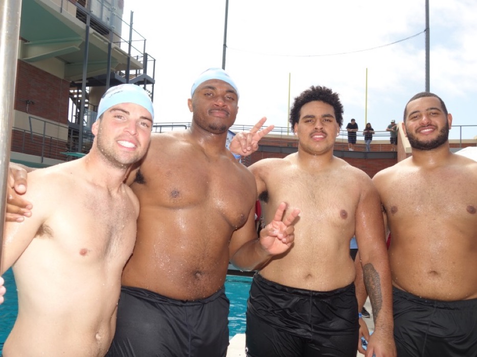 Congrats to @ChocoDro, seen here at Swim with Mike in 2018, on being selected #18 in the NFL Draft by the Miami Dolphins! #FightOn