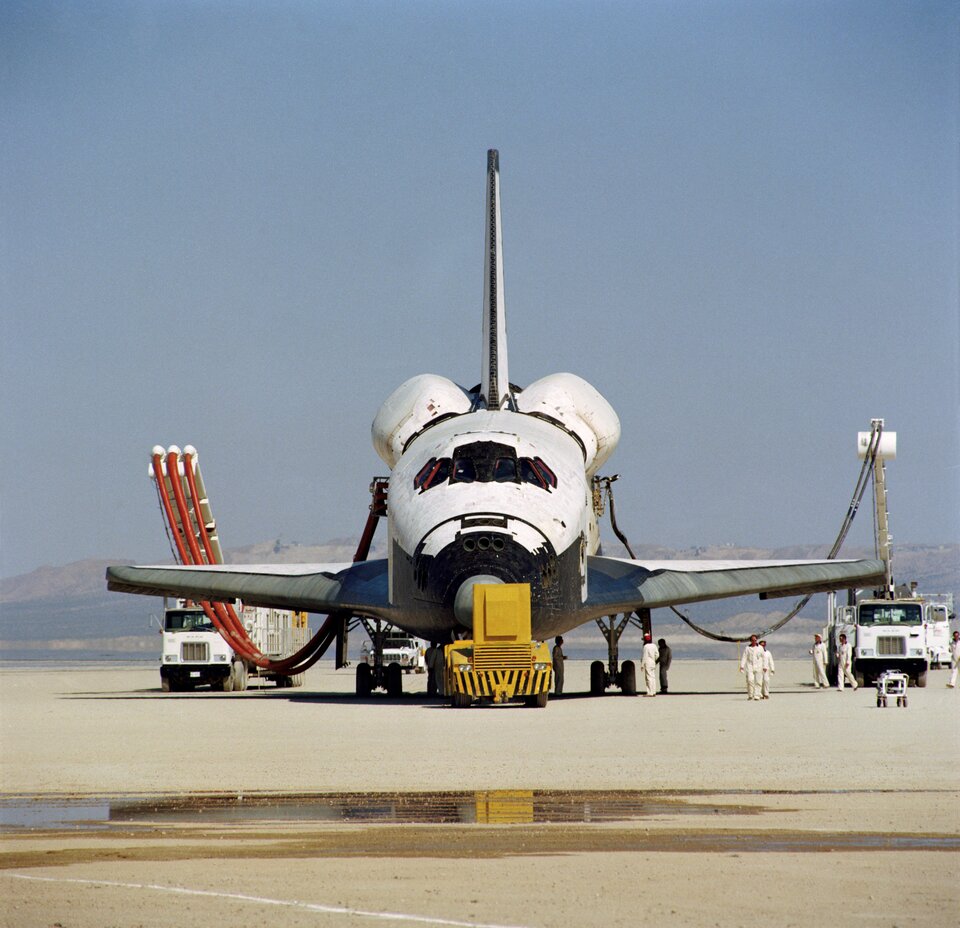 2 sets of solar arrays were contracted from European industry, plus electronics and Solar Array Drive Mechanisms, with (then) high-efficiency 12.7% silicon solar cells, silver connectors & protective Kapton. But the 1st Space Shuttle flights presented a problem 8/28