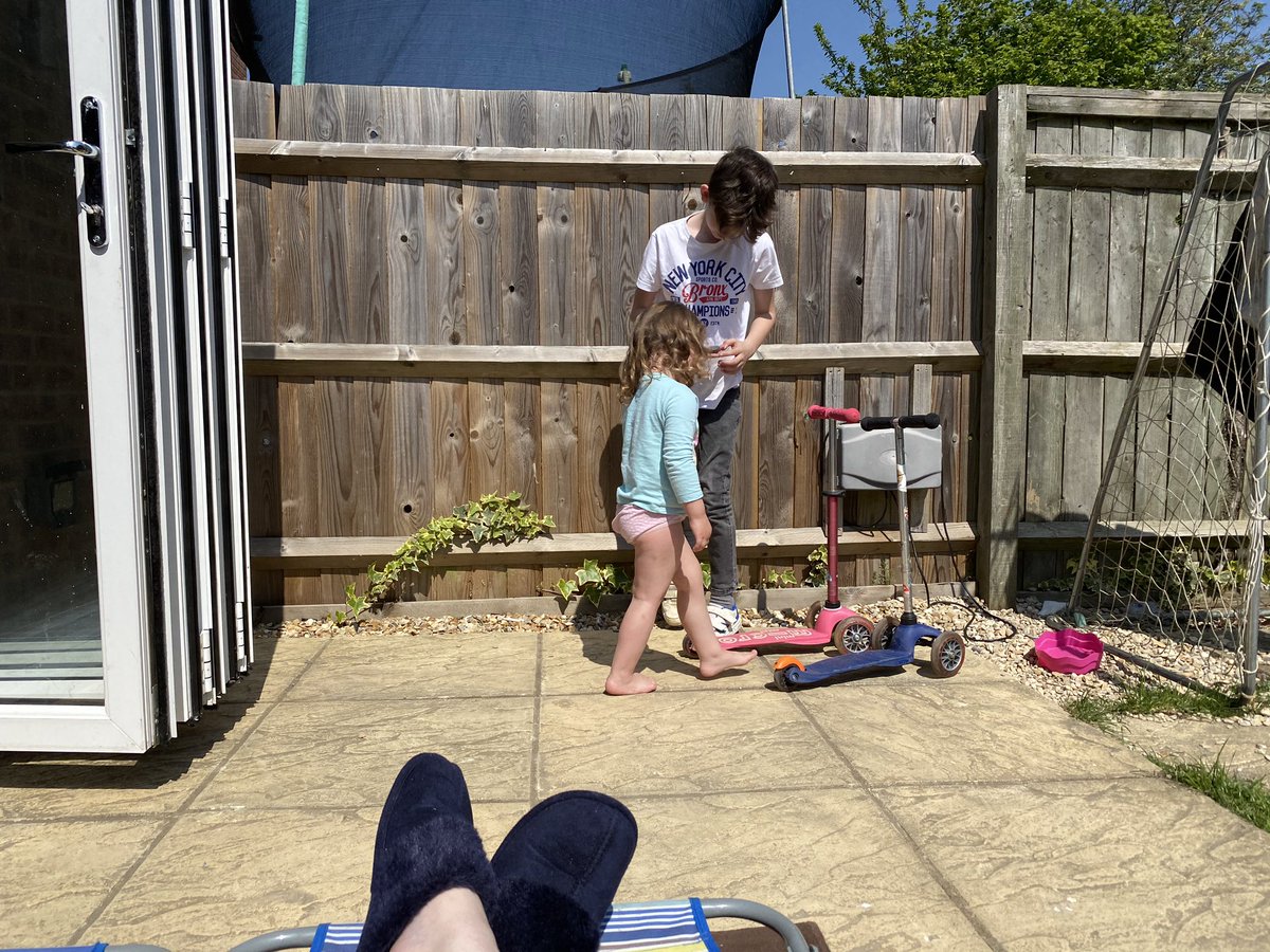 jocreeve's tweet image. Bleary eyed &amp;amp; exhausted after a long shift last night. I’m sat in the sun for a bit watching two of my faves play, before my next shift starts. #keyworkers #shiftwork #homeschooling