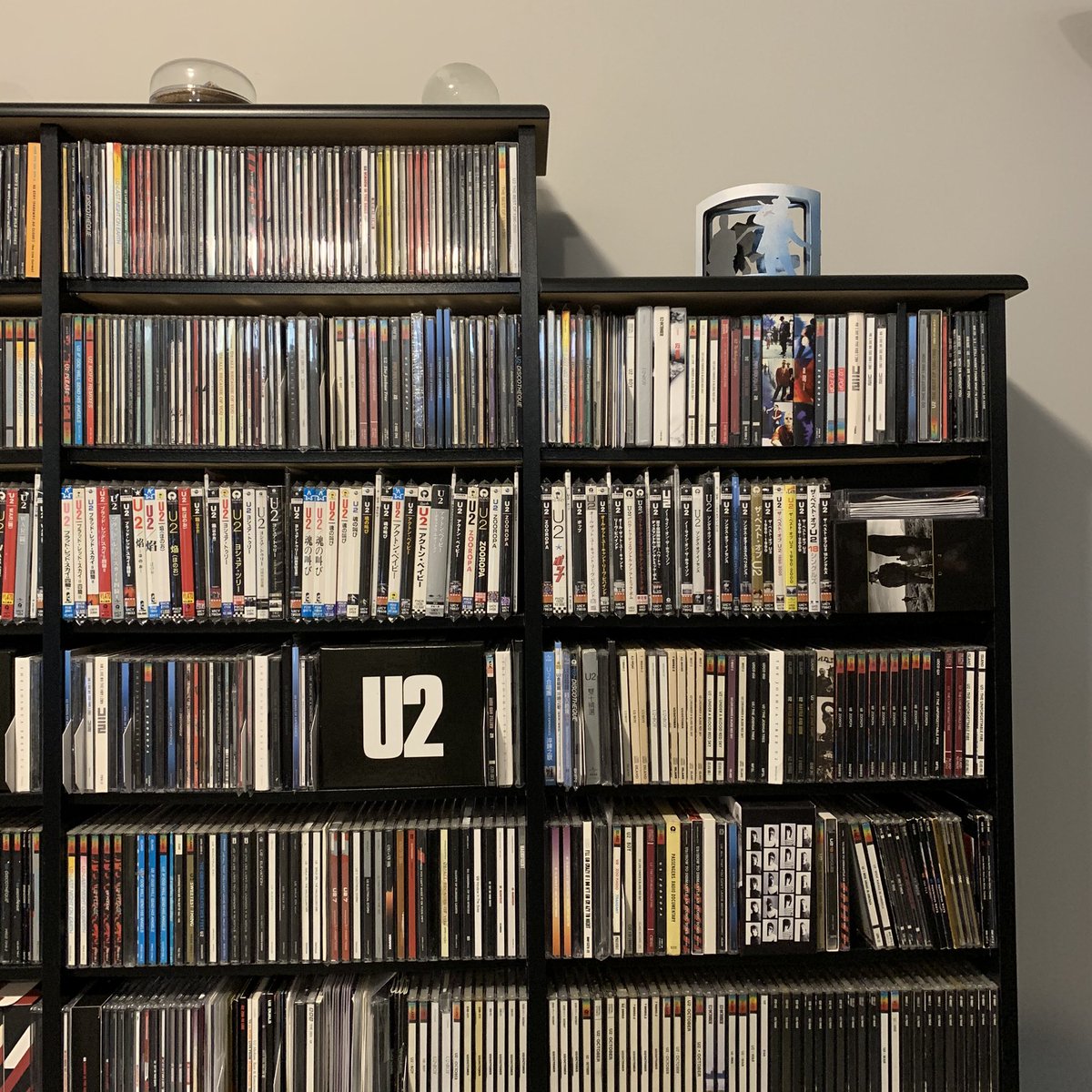 Photo 8: CDs. Sorted by country, then album or single, then chronologically. On top is a chunk of the paint from Windmill Lane before it was torn down.