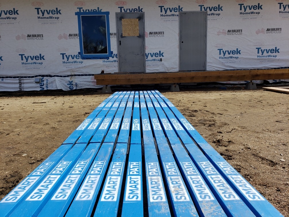 SmartpathSystem's tweet image. Easily create a 4' wide SmartPath™ instant-path solution!  Using our patented #recycledrubber bases, 2x4"x8' lumber: a 22" wide path is quick &amp;amp; easy to build.  
Or, lay 2 paths side-by-side, connect with joiner board, fasten to the side-support of the base.  Widened path!