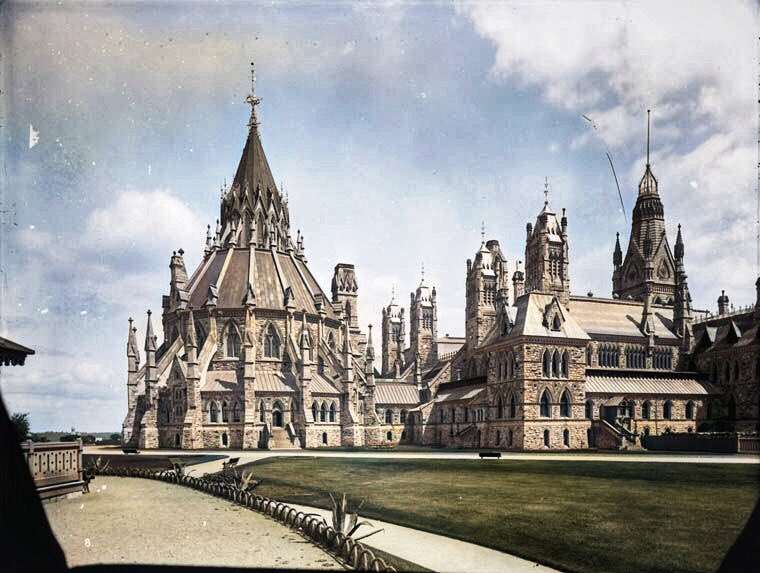 At the request of  @EricGrenierCBC, here are some more colourizations of the past, courtesy of Deoldify. We begin in John A Macdonald’s Ottawa. The original parliament buildings from the back view...