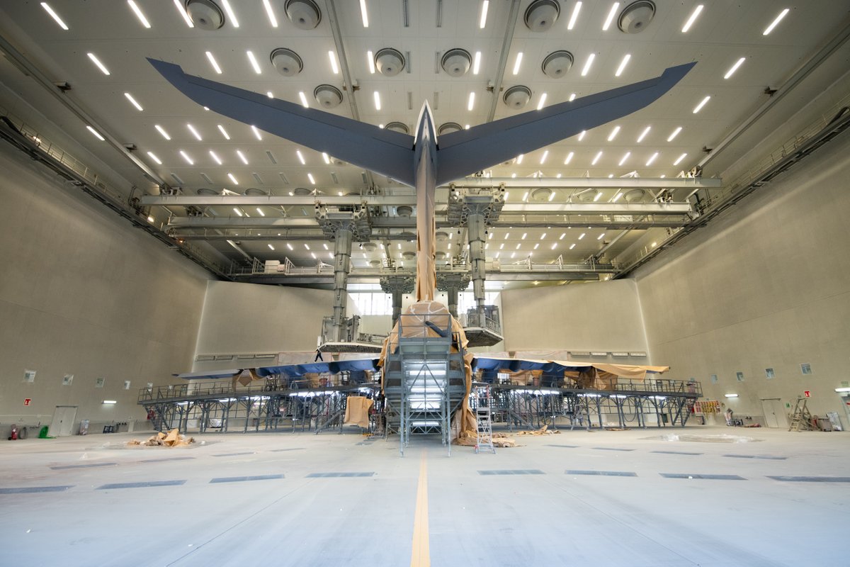 AirbusDefence's tweet photo. Once assembled, the first of a total of 7️⃣ #A400M for @BeAirForce 🇧🇪 enters the paint shop and starts going grey! 
Follow the painting process here 👇
Stay tuned…😉 https://t.co/wi2SmsWCDR