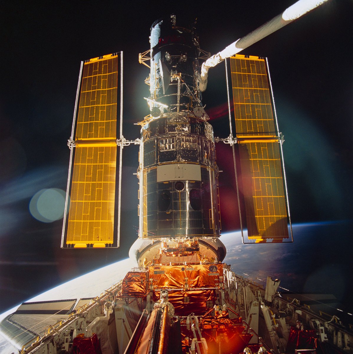And  @NASAHubble was deemed saved. This was the first of five servicing missions for the telescope, the latter conducted to extend the its wavelength range, install new gyros, replace solar panels and more, extending Hubble’s life far beyond its initial design.