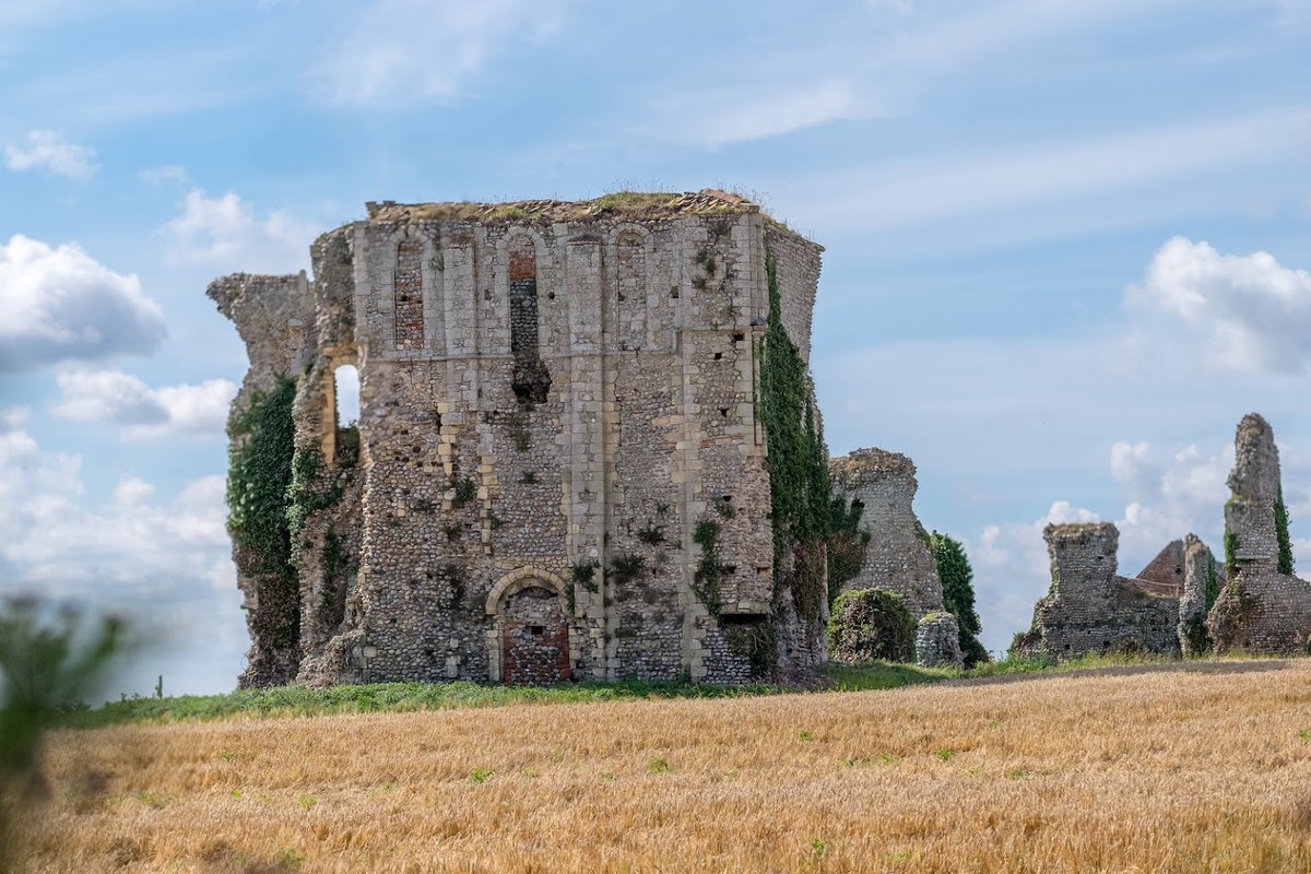 Broomholm Priory, Bacton. Cluniac founded from Castle Acre. Famous for its holy rood relic, but dissolved in 1536 because it came under £200. Main survivals N transept (fortified w concrete in WW2), S wall of S transept with chapter house arcading.Shame the ruins are private