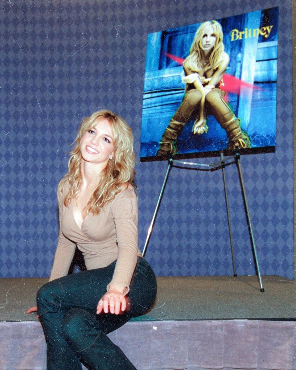 Britney at her “Britney” album release conference.