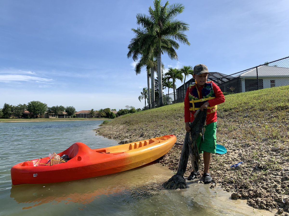 SaraBarry2017's tweet photo. Spirit Week was so much fun, and my little sweetie loved Pajama Day!  His Science lesson on Earth Day was  to help our environment so we kayaked in our nearby lake pulling out plastic and other trash.  Kadin wants to protect the fish and birds! 🌎💕 @CESCorkyBear @collierschools https://t.co/iK88mChDaN