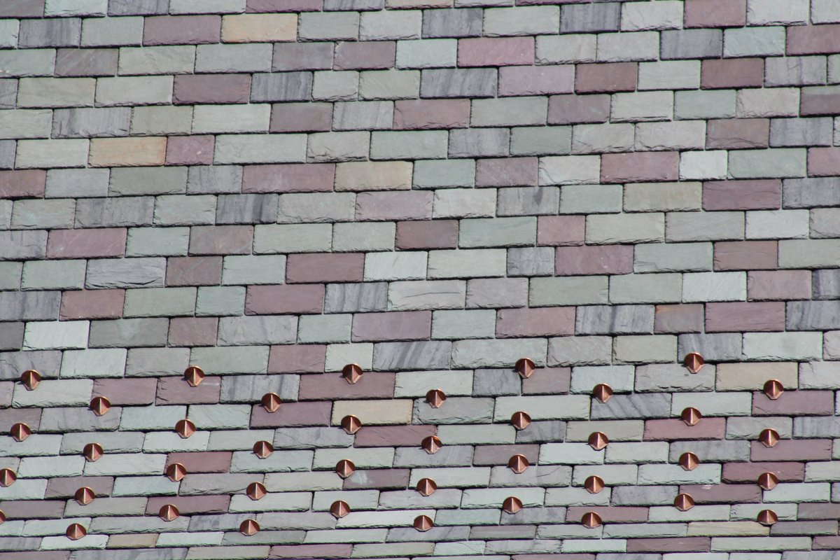 No filter needed to capture the true beauty of a natural slate roof! North Country Slate offers design suggestions on color, size, thickness and installation techniques which will produce a spectacular custom slate roof! Call us at Toll Free 1-800-975-3835