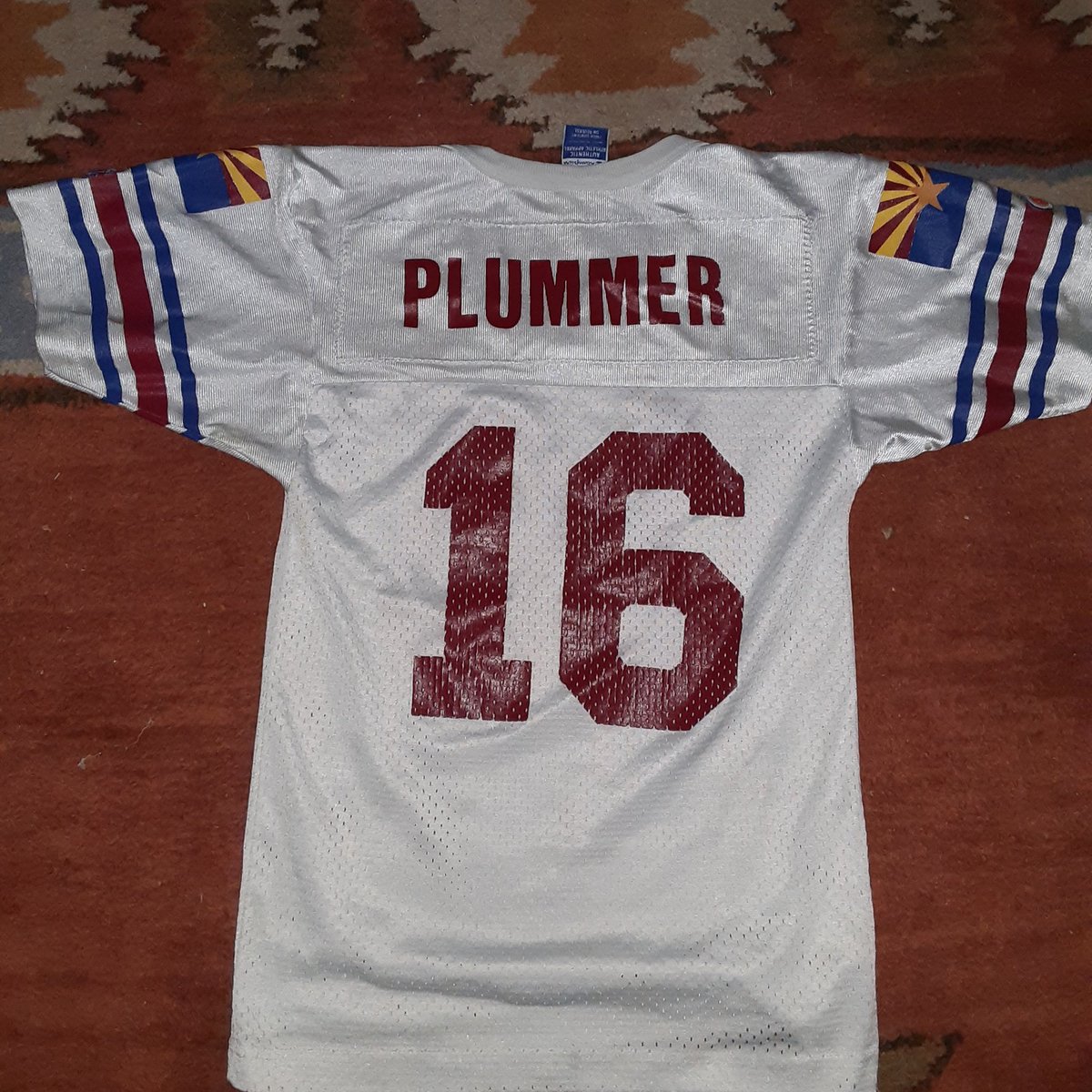 tychan888's tweet photo. My Plummer jersey. I got it for my birthday 20 years ago. Now I've passed it down to my kids and they wear it proudly. Always cheer for my #Idahomies @snakestakes https://t.co/yJq1oGe7PL
