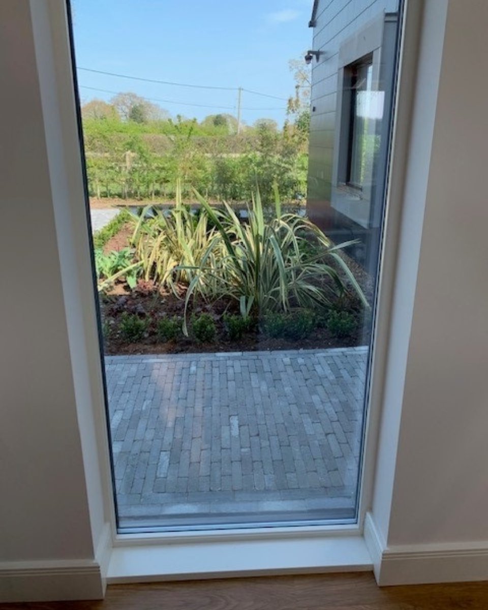 Full height windows really help to connect the inside of your home to the outside! Glimpsed views like this help a property such as this Norfolk self build to stand out. Call 01603713528 for more information #StayAtHome #Landscaping #Homeworking #Construction #Architecture