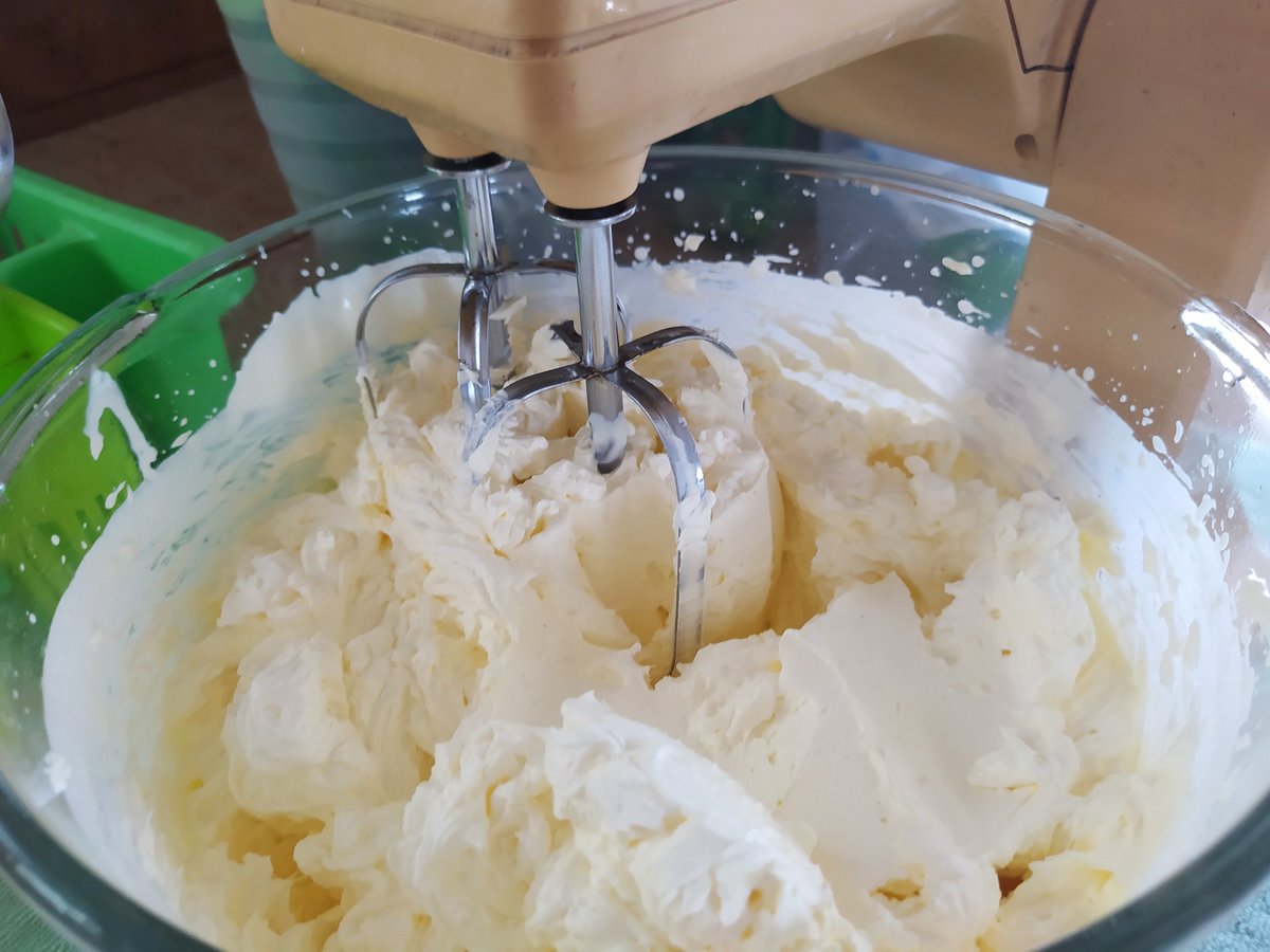 Whip the cream till it's very very stiff. This recipe doesn't use gelatin so every bit helps the cheesecake texture. Then fold the cream cheese mixture in. Don't over mix it. 10 seconds is plenty. It should be stiff like in the last photo when you spoon it onto the base.