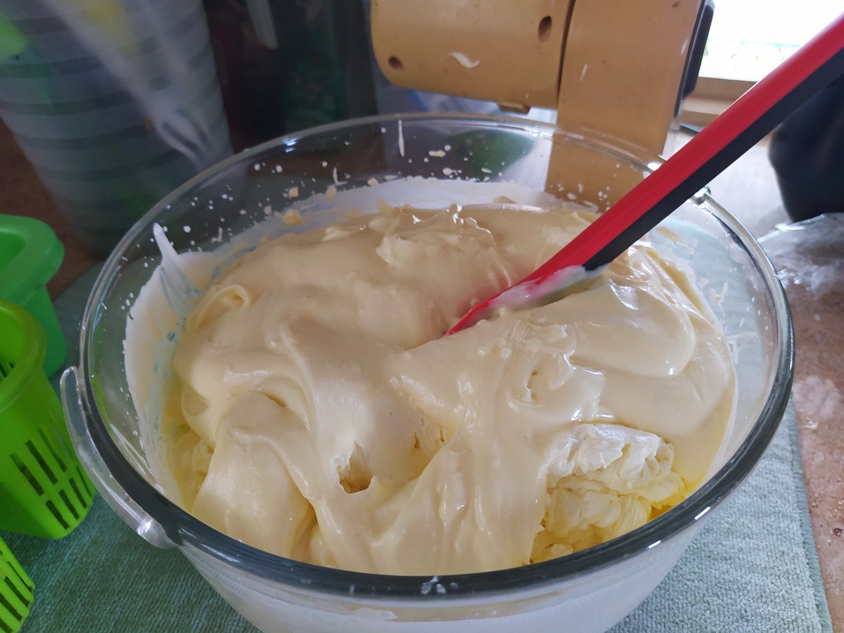 Whip the cream till it's very very stiff. This recipe doesn't use gelatin so every bit helps the cheesecake texture. Then fold the cream cheese mixture in. Don't over mix it. 10 seconds is plenty. It should be stiff like in the last photo when you spoon it onto the base.