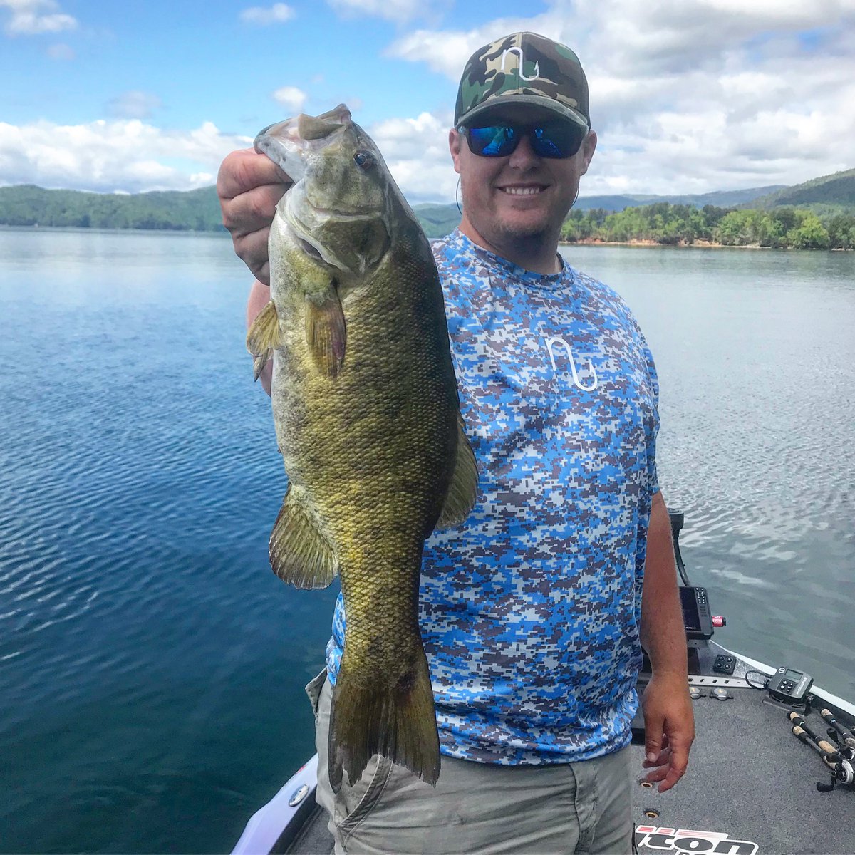 jake_whitaker_'s tweet photo. Found me a purty brown one today on the lake! Never know what species of bass will bite in the Carolina mountains! What do you think this one was fooled by? @Bassmaster #bassfishing #smallmouth #fishing #alxrods #nuthreadz #blueotterpolarized https://t.co/OU7Tt8vOHa