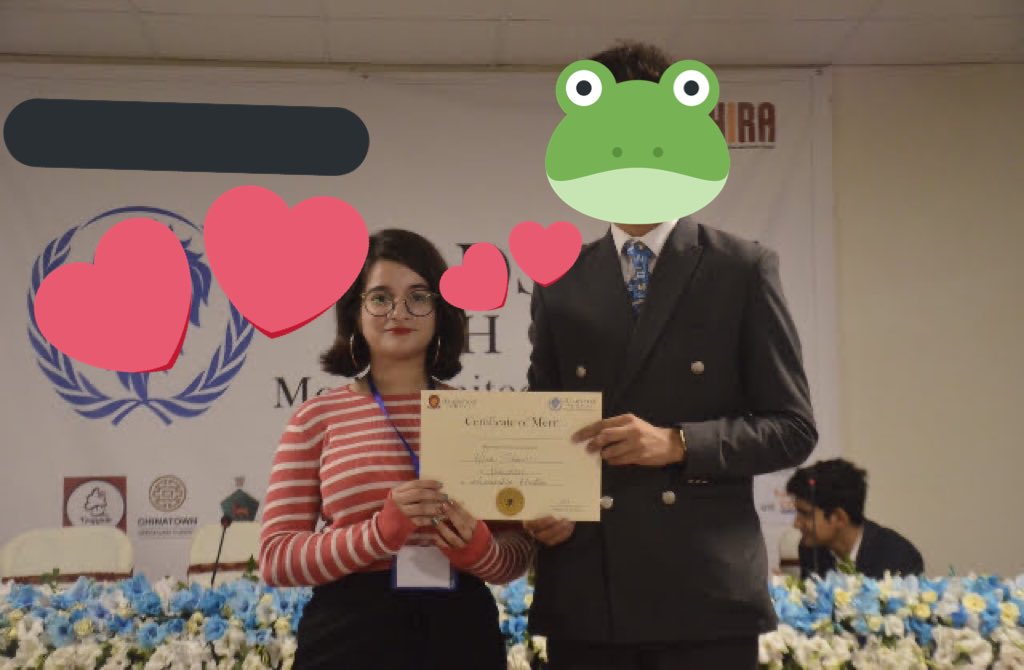 2/2! won an award despite the fact that i literally talked the bare minimum but the chair (not pictured, this is the co-chair) is known for weird awarding habits so makes sense rip (LOOK HOW TINY HE MADE ME LOOK i had a crush on him)