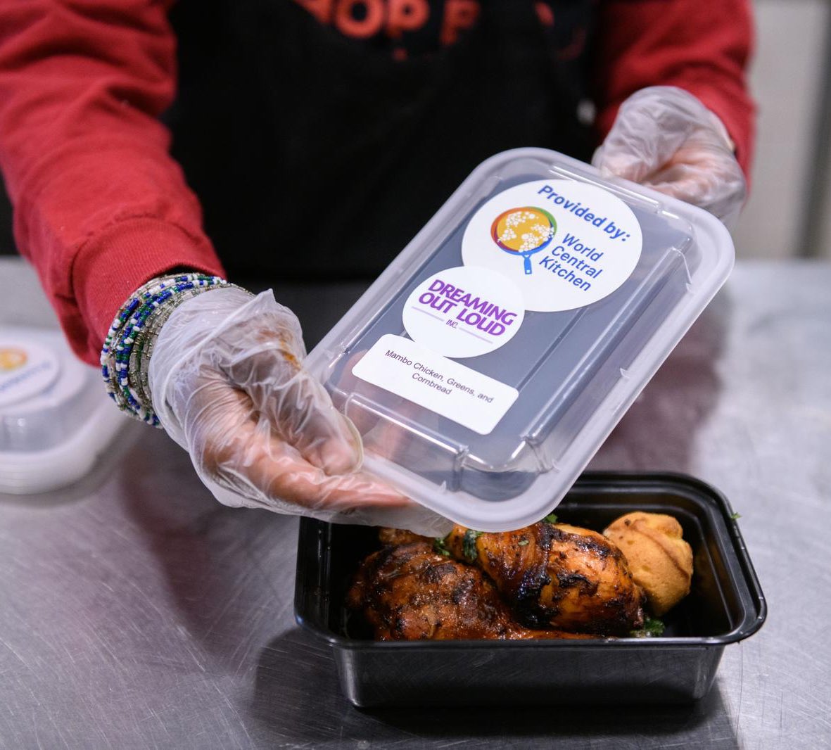 WCKitchen's tweet photo. Margaret is the founder of District Chop Bar, serving West African cuisine in DC. With WCK’s support, she’s been able to hire additional part-time staff! Today’s meal is a drool-worthy Mambo Chicken, Greens &amp; Cornbread, destined for the community at Fort Lincoln. #ChefsForAmerica https://t.co/B4hu03sxed