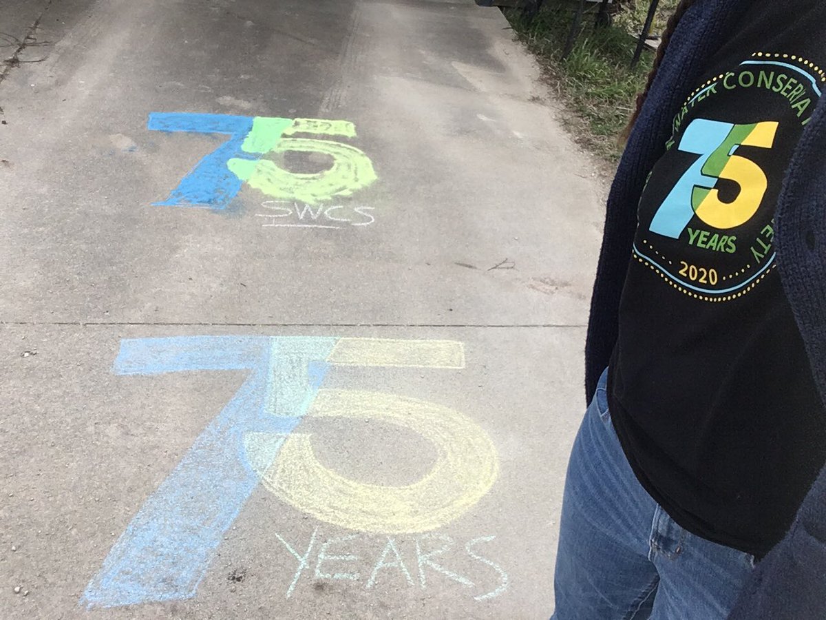 Viriette's tweet photo. The Earth Week Chalk Challenge = good excuse to break out the sidewalk chalk!  I drew the #SWCS75 logo, too (because it’s not just #EarthWeek, but timing is also between #HughHammondBennett’s birthday &amp; #SoilAndWaterConservationWeek / #StewardshipWeek!) @SWCSNews https://t.co/wAwDA5FrTs