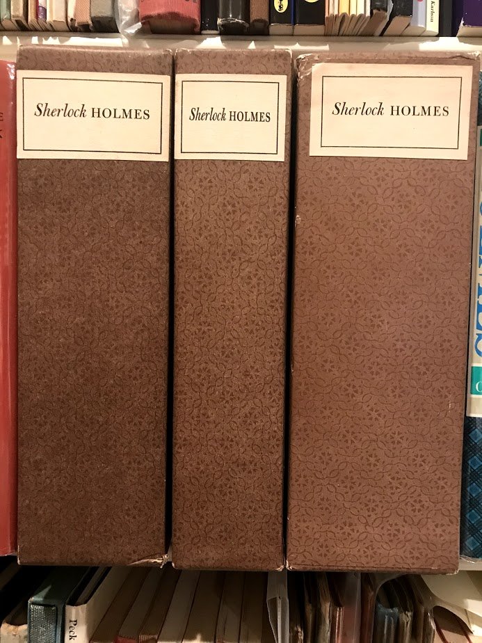 And finally, the creme de la creme of our collection of complete Sherlock Holmes stories: the Limited Editions Club / Heritage Press set, of 8 volumes, in their original onion skin dust jackets and with the original accompanying paperwork.