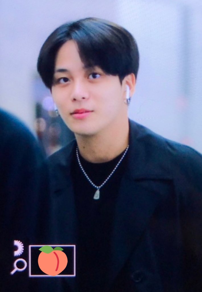 barefaced jongho with floofie unstyled hair showing his forehead . __