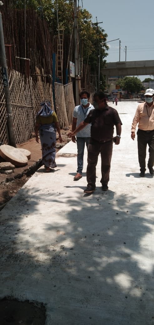 Laying VDCC road from Musherabad x roads to CGO towers on Kavadiguda main road under CRMP